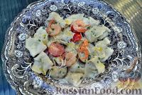Фото к рецепту: Тортеллини с лососем в сырном соусе