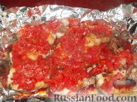 Фото приготовления рецепта: Рыба, запеченная с помидорами - шаг №9