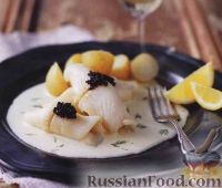 Фото к рецепту: Рыбные рулетики в сливочном соусе