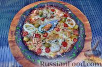 Фото к рецепту: Пицца с морепродуктами