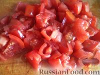 Фото приготовления рецепта: Паста с кальмарами и помидорами - шаг №5