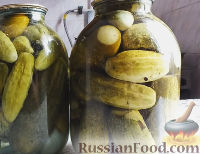 Фото к рецепту: Консервированные огурчики на зиму