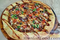 Фото к рецепту: Пицца с соусом болоньезе