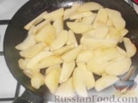 Фото приготовления рецепта: Картофель, тушеный с баклажанами и кабачками - шаг №7