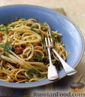 Фото к рецепту: Спагетти с соусом из анчоусов, помидоров и оливок