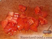Фото приготовления рецепта: Жареные кальмары с овощами - шаг №5