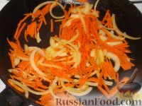 Фото приготовления рецепта: Жареные кальмары с овощами - шаг №6
