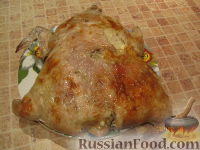 Фото к рецепту: Курица, фаршированная рисом