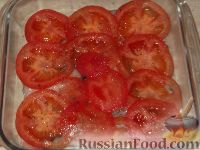 Фото приготовления рецепта: Минтай, запеченный с помидорами и сыром - шаг №5