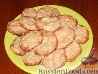Фото к рецепту: Овсяное печенье с изюмом