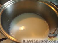 Фото приготовления рецепта: Соус из крыжовника с чесноком, мятой и петрушкой (на зиму) - шаг №19