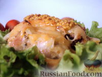 Фото к рецепту: Маринованные куриные бедрышки под сыром