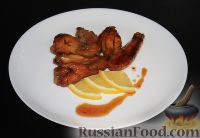 Фото к рецепту: Куриные крылышки в медово-соевом соусе