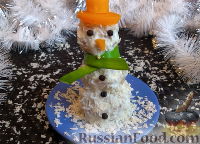 Фото к рецепту: "Снеговик" из куриных шариков в сливочном соусе