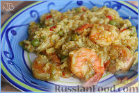 Фото к рецепту: Креветки с рисом по-португальски