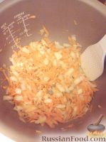 Фото приготовления рецепта: Плов с мандаринами и изюмом - шаг №4