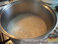 Фото приготовления рецепта: Каша рисовая на молоке - шаг №7