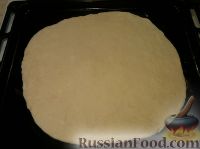Фото приготовления рецепта: Пирог с сырой картошкой - шаг №9
