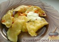Фото к рецепту: Домашние вареники с картошкой и кислой капустой