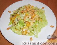 Фото к рецепту: Салат из пекинской капусты, с апельсином, яблоком, орехами