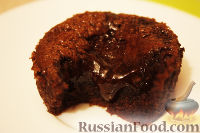 Фото к рецепту: Шоколадные кексы с жидкой начинкой