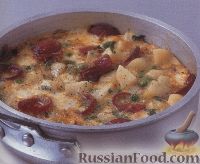 Фото к рецепту: Тортилья с картофелем, салями, горошком и сыром
