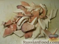Фото приготовления рецепта: Кальмары, тушенные в сметане - шаг №3