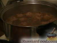Фото приготовления рецепта: Щи из квашеной капусты с фрикадельками - шаг №5