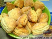 Фото к рецепту: Песочно-творожное печенье с кокосовым ароматом