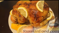 Фото приготовления рецепта: Курица, запеченная с яблоками и апельсинами - шаг №14