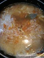 Фото приготовления рецепта: Тушеная капуста с рисом (лаханоризо) - шаг №3