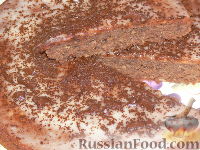 Фото к рецепту: Шоколадный пирог с какао, яблоками и ванильным кремом