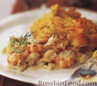 Фото к рецепту: Морепродукты, запеченные с картофелем
