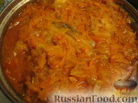 Фото приготовления рецепта: Хек под маринадом в томатном соусе - шаг №4