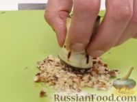 Фото приготовления рецепта: Рулетики из баклажанов с сыром, орехами и зеленью - шаг №10