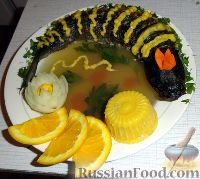 Фото к рецепту: Заливное и фаршированная рыба с сырно-апельсиновым соусом
