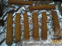 Фото приготовления рецепта: Жареные палочки из картофельного пюре, с кунжутом (во фритюре) - шаг №10