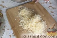 Фото приготовления рецепта: Рулетики из баклажанов с сырной начинкой - шаг №7