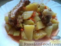 Фото к рецепту: Рагу из свиных ребрышек, с картофелем и кабачками