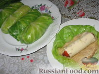 Фото приготовления рецепта: Сосиски в капустных листьях - шаг №5