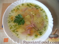 Фото к рецепту: Суп с колбасой и рисом