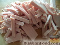 Фото приготовления рецепта: Суп с колбасой и рисом - шаг №5