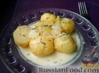 Фото к рецепту: Молодой картофель, тушенный в сметане