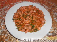 Фото приготовления рецепта: Поджарка из колбасы или сосисок - шаг №12
