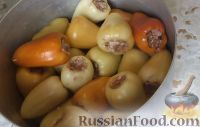 Фото приготовления рецепта: Болгарский перец, фаршированный мясом и рисом - шаг №7