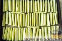 Фото приготовления рецепта: Кабачки, запеченные в духовке, с сыром и специями - шаг №7