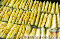 Фото приготовления рецепта: Кабачки, запеченные в духовке, с сыром и специями - шаг №10