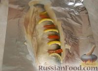 Фото приготовления рецепта: Молочная рыба, запеченная в фольге - шаг №6