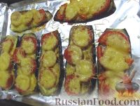 Фото приготовления рецепта: Баклажаны, запеченные с помидорами и сыром - шаг №7