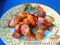 Фото к рецепту: Кабачки, тушенные в томатном соусе